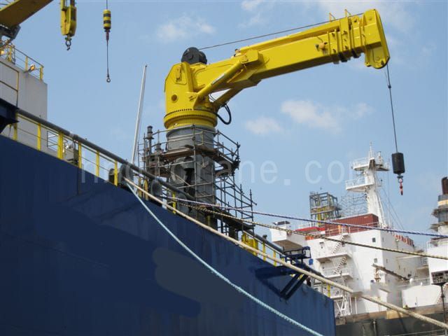 Small telescopic boom cranes