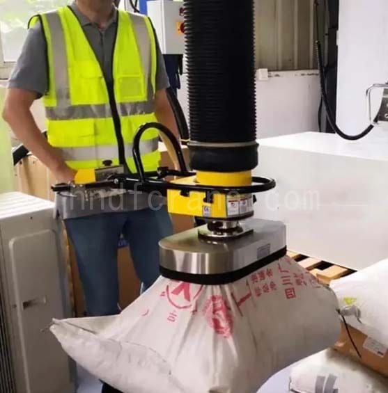 Vacuum suction crane to carry bag