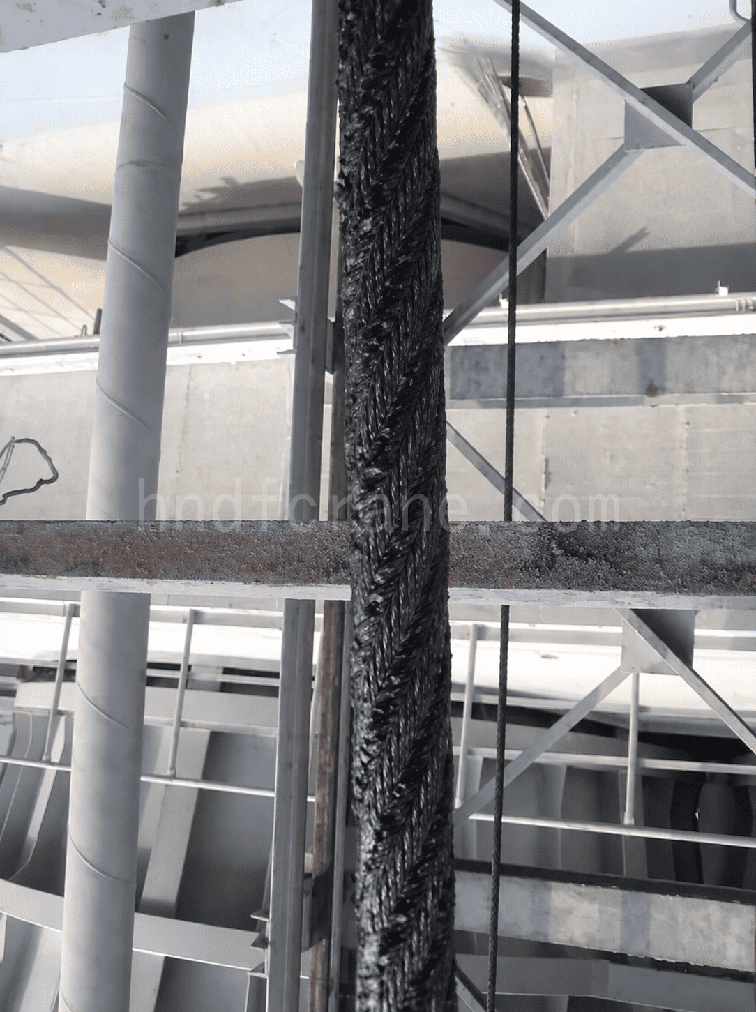 Before the wire rope passes through the lubricator